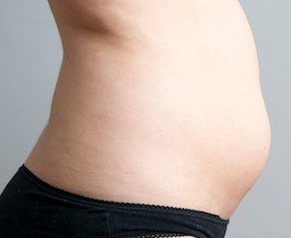 bloated stomach of a woman