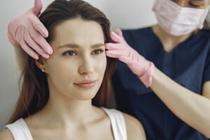 woman being assessed for endoscopic brow lift or forehead lift 